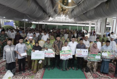 Bupati Enos Serahkan Bantuan hingga Ajak Warga Perkuat Kerukunan dan Kebersamaan